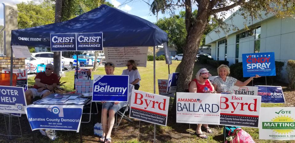 Campaign supporters rally voters in Palmetto.