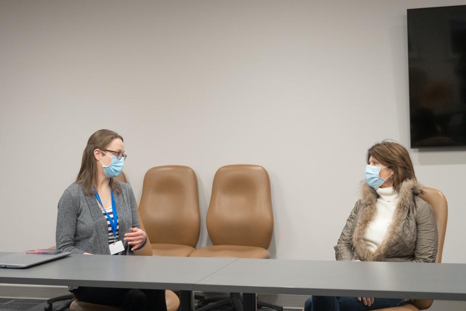 Crusader Community Health's Director of Pharmacy Services Dr. Laura Dee speaks with U.S. Rep. Cheri Bustos about COVID-19 treatments on Friday, January 28, 2022.
