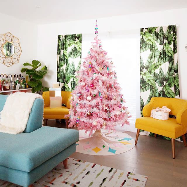 <p>In this colorful, retro room, a pink tree feels totally natural. Pastel ornaments and white tinsel pops against soft pink branches.</p><p><a rel="nofollow noopener" href="http://www.treetopia.com/colored-artificial-christmas-trees-p/pink-christmas-tree.htm" target="_blank" data-ylk="slk:BUY NOW;elm:context_link;itc:0;sec:content-canvas" class="link ">BUY NOW</a><br></p>