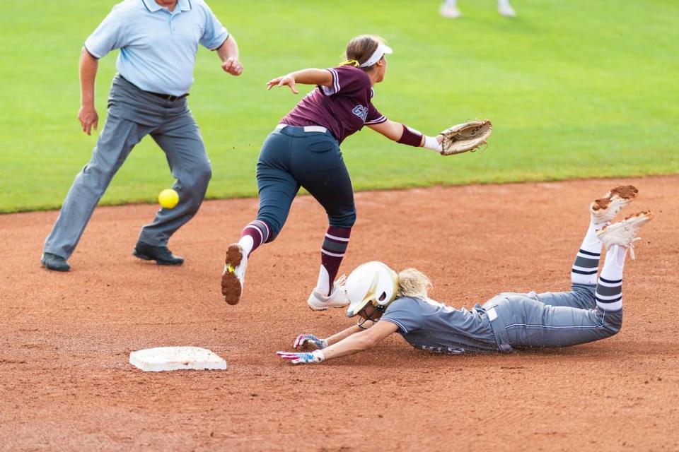 Jayda Coleman steals second and comes around to score after a Calallen error during the 5A state semifinals, Friday May 31, 2019.