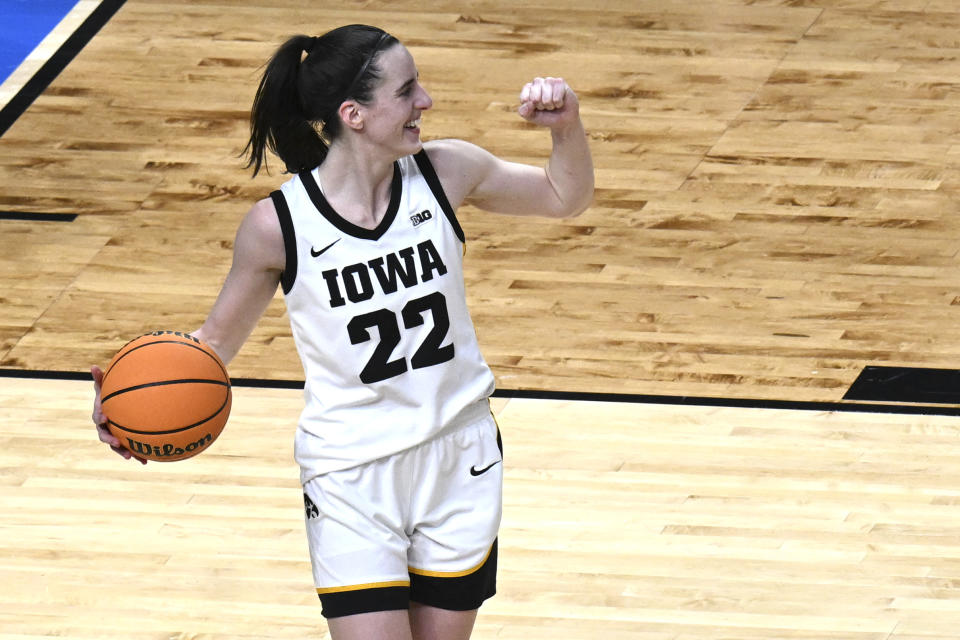 Iowa guard Caitlin Clark (22) reacts after Iowa defeated LSU in an Elite Eight round college basketball game during the NCAA Tournament, Monday, April 1, 2024, in Albany, N.Y. (AP Photo/Hans Pennink)
