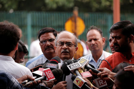 Prashant Bhushan, a senior lawyer, speaks with the media after a verdict on right to privacy outside the Supreme Court in New Delhi, India August 24, 2017. REUTERS/Adnan Abidi