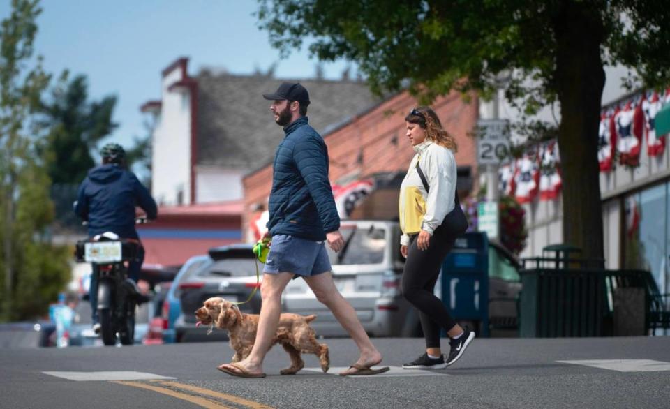 Visitors explore Friday Harbor, Washington, on San Juan Island on Monday, June 26, 2023.