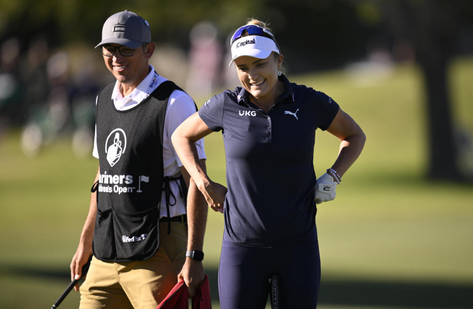 Lexi Thompson of the United States and caddie Jon Scolari react on the 11th hole during the second round of the Shriners Children’s Open at TPC Summerlin on October 13, 2023 in Las Vegas, Nevada. (Photo by Orlando Ramirez/Getty Images)