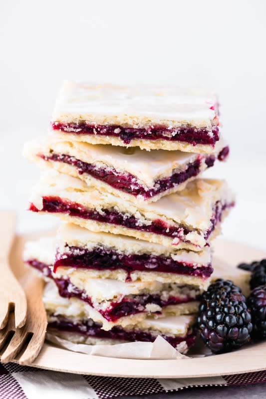 <p>The View from Great Island</p><p>The flaky pastry, the jewel-toned filling, and the sweet little glaze all work together in this super easy-to-eat dessert.</p><p><strong>Get the recipe: <a href="https://theviewfromgreatisland.com/blackberry-slab-pie-bars-recipe/" rel="nofollow noopener" target="_blank" data-ylk="slk:Blackberry Slab Pie Bars;elm:context_link;itc:0;sec:content-canvas" class="link ">Blackberry Slab Pie Bars</a></strong></p>