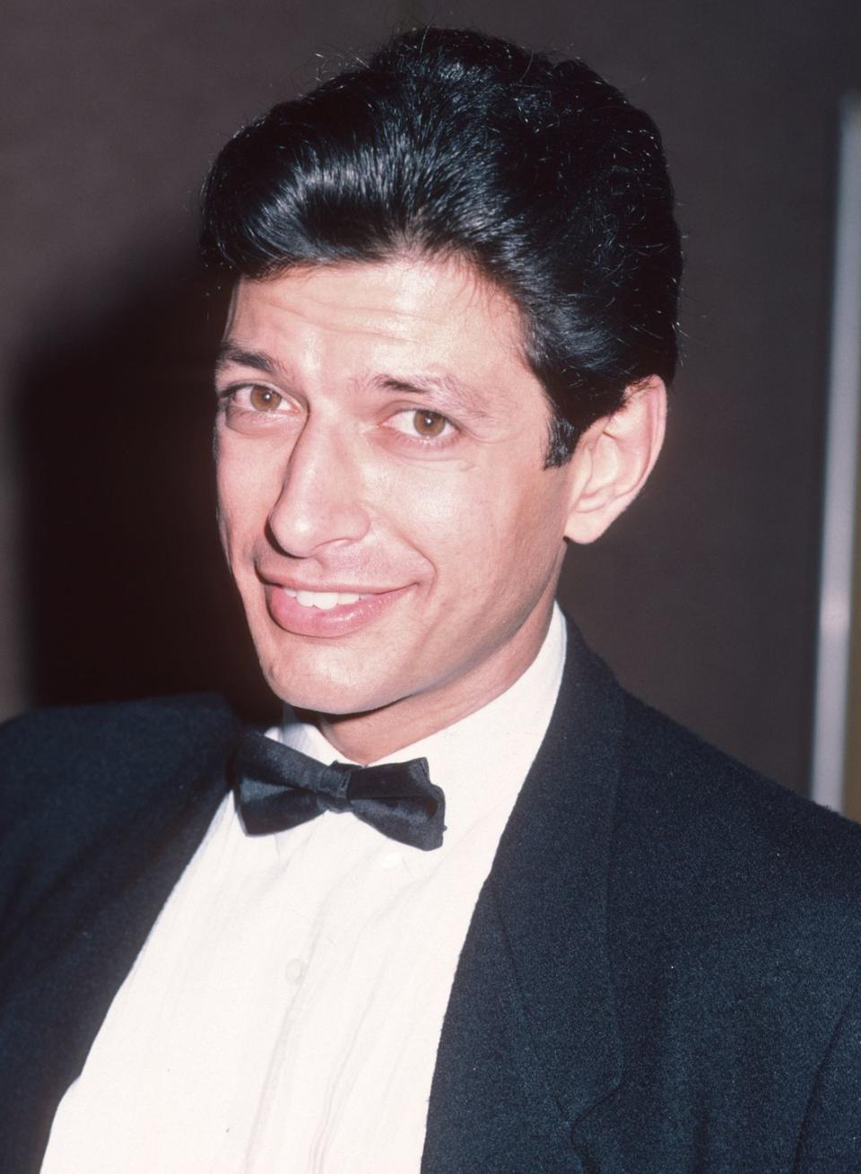 <p>Jeff Goldblum looked every bit a movie star back in the day when the <em>Jurassic Park </em>star's thick hair could rival that of Elvis Presley. </p>