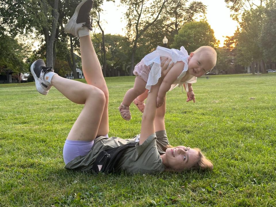 Liza Smetankina holds her daughter Emilia, who was born in Canada about three months after the family arrived.