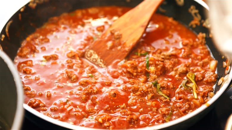 Meat based tomato sauce in skillet 