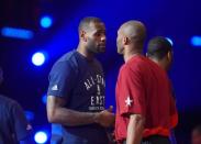 Feb 14, 2016; Toronto, Ontario, CAN; Eastern Conference forward LeBron James of the Cleveland Cavaliers (left) greets Western Conference forward Kobe Bryant of the Los Angeles Lakers (right) before the NBA All Star Game at Air Canada Centre. Mandatory Credit: Bob Donnan-USA TODAY Sports