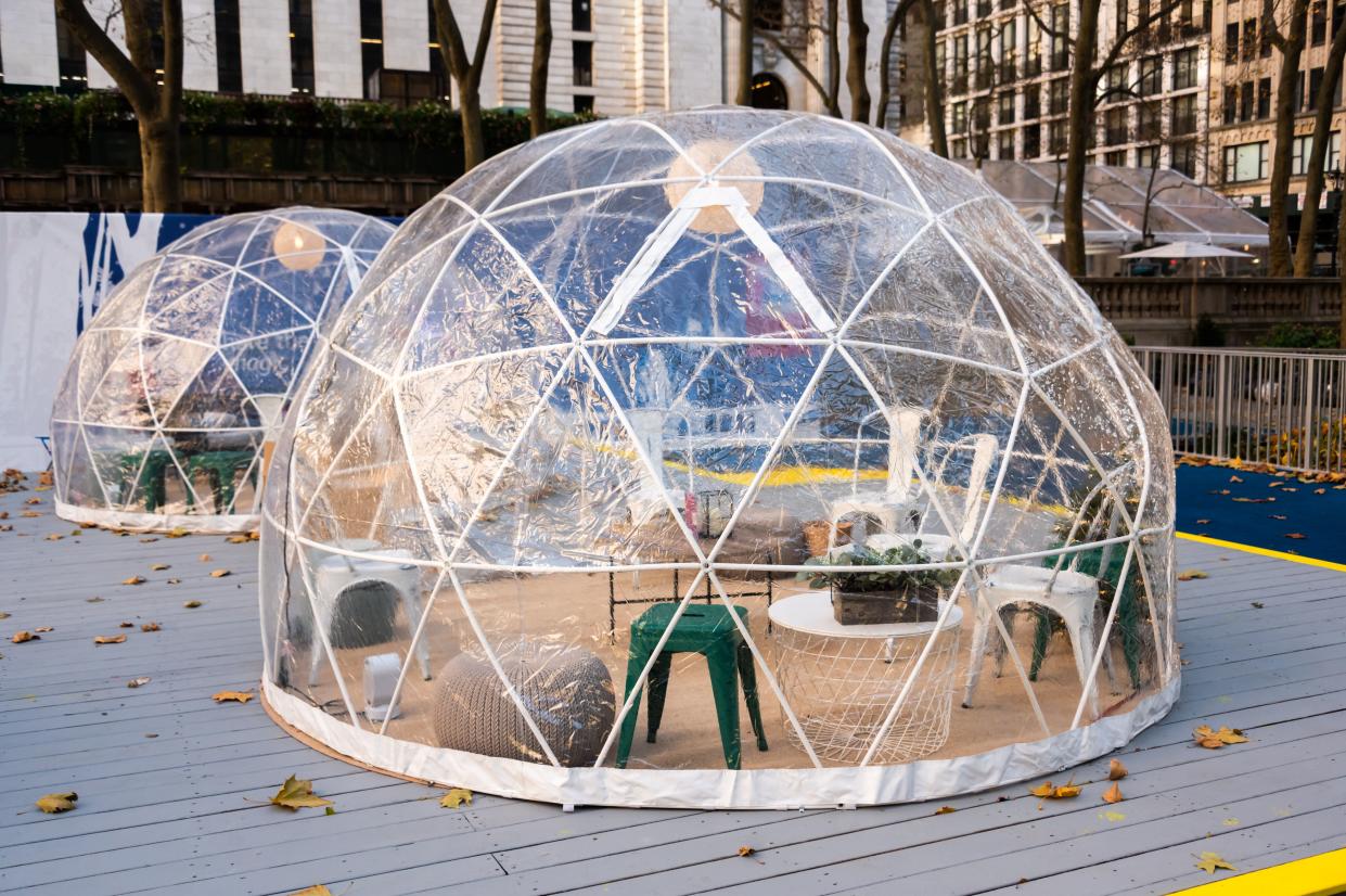 Igloo dining tents are set up at Bryant Park as New York City follows restrictions imposed to slow the spread of coronavirus. (Photo: Noam Galai via Getty Images)