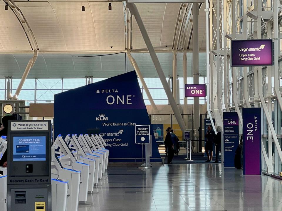 Kiosks at the Delta One check-in space at JFK Terminal 4.