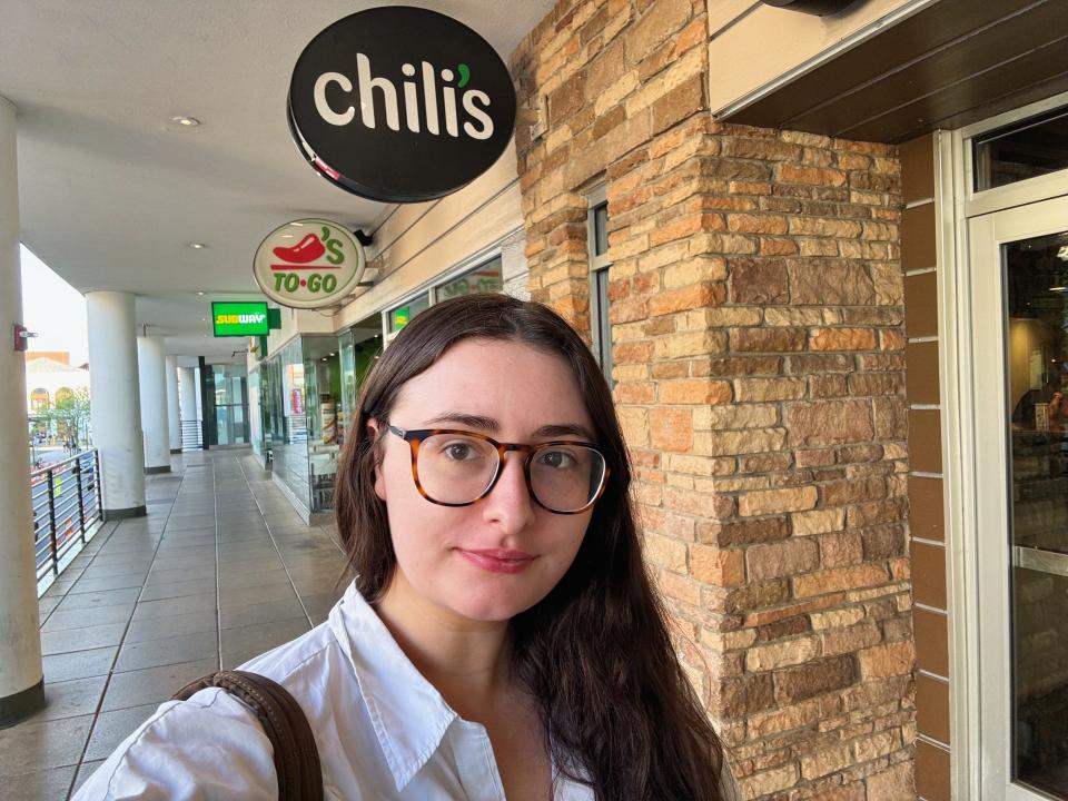 author outside chilis restaurant