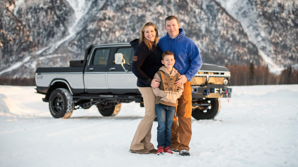 The Leathem family stand in front of their 1975 Ford F-250 restomod pickup that they built together.