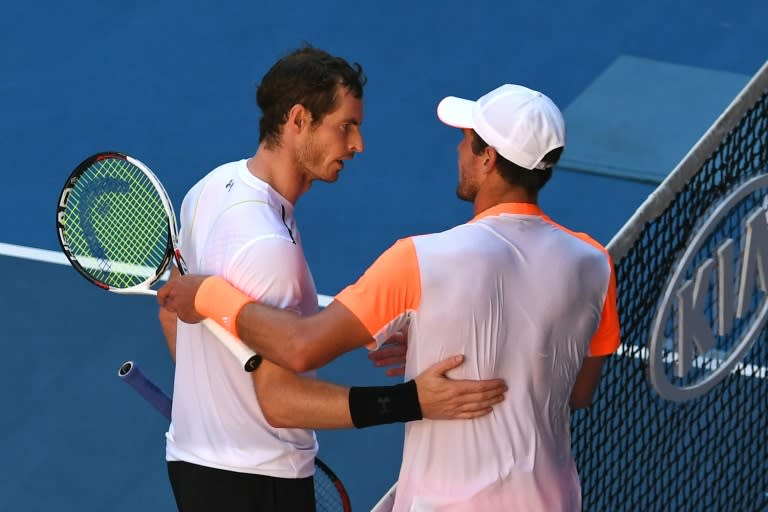 World number one Andy Murray (L) has been dumped out of the Australian Open in the fourth round by 50th-ranked Mischa Zverev (R)