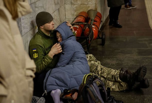 PHOTO: People shelter inside a subway station during a Russian missile attack in Kyiv, Ukraine, March 9, 2023. (Alina Yarysh/Reuters)