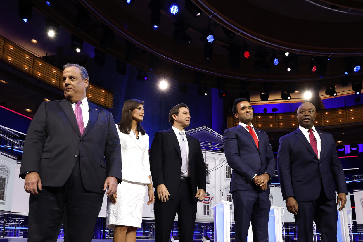 Republican candidates stand together on the debate stage in Miami on Wednesday. (Anna Moneymaker/Getty Images)