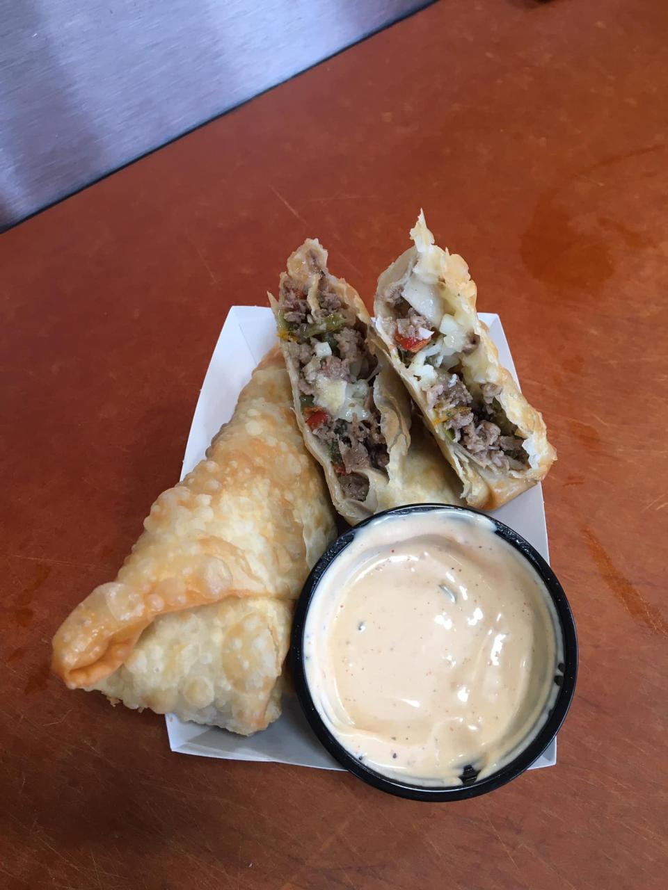 A Philly cheesesteak eggroll made by Kickin Kurbz mobile kitchen in Battle Creek.