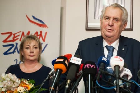 FILE PHOTO: Czech President Milos Zeman next to his wife Ivana attends a news conference, after polling stations closed for the country's direct presidential election, in Prague, the Czech Republic January 13, 2018. REUTERS/Matej Stransky/Pool