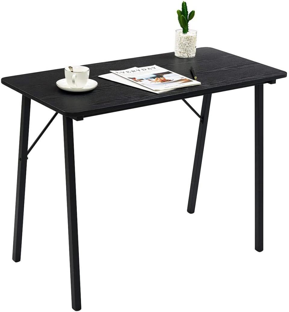 If you want a desk that doesn't have too many frills but will get the job done &mdash; this one might be it. It's perfect for a small computer or stacks of workbooks. <a href="https://amzn.to/3hjcP4C" target="_blank" rel="noopener noreferrer">Find it for $80 at Amazon</a>.