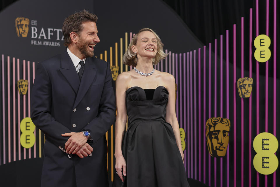 Bradley Cooper, left, and Carey Mulligan pose for photographers upon arrival at the 77th British Academy Film Awards, BAFTA's, in London, Sunday, Feb. 18, 2024. (Photo by Vianney Le Caer/Invision/AP)