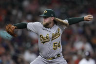 Oakland Athletics relief pitcher Kirby Snead delivers during the eighth inning of a baseball game against the Houston Astros, Saturday, Aug. 13, 2022, in Houston. (AP Photo/Kevin M. Cox)