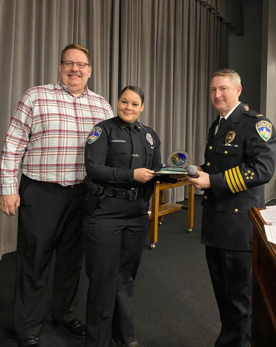 John Aller, executive director of Stark County Mental Health & Addiction Recovery, left, stands with Crisis Intervention Team Officer of the Year Jennifer Henderson and Canton Police Chief John Gabbard at the Crime Prevention Breakfast. The annual event was held Wednesday at First Christian Church in Plain Township.