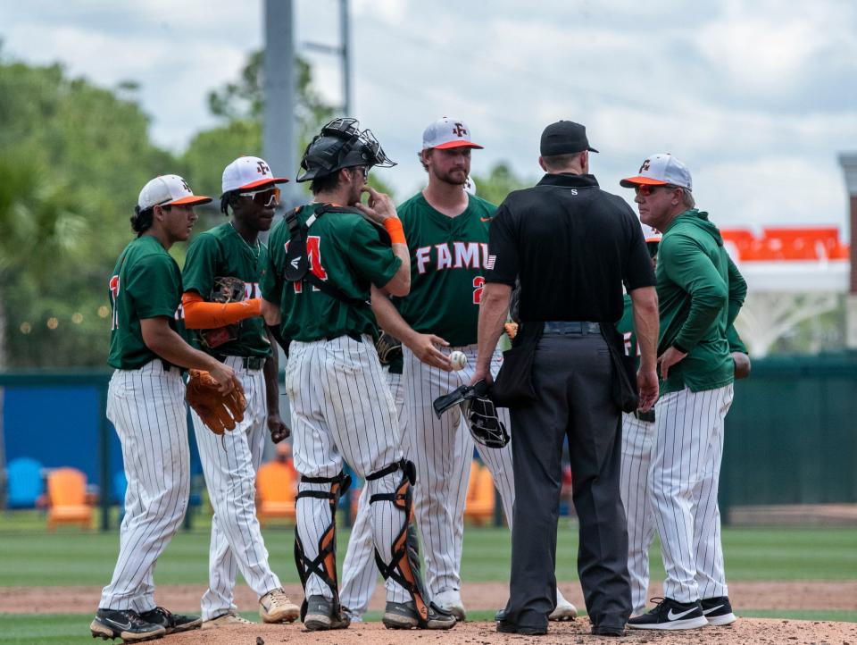 Florida A&M head coach Jamey Shouppe with a mound visit in the top of the third inning against U Conn in Round 2 of NCAA Regionals, Saturday, June 3, 2023, at Condron Family Ballpark in Gainesville, Florida. The Rattlers lost to the Huskies 9-6. [Cyndi Chambers/ Gainesville Sun] 2023  