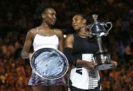 Tennis - Australian Open - Melbourne Park, Melbourne, Australia - 28/1/17 Serena Williams of the U.S. holds her trophy after winning her Women's singles final match against Venus Williams of the U.S. .REUTERS/Issei Kato