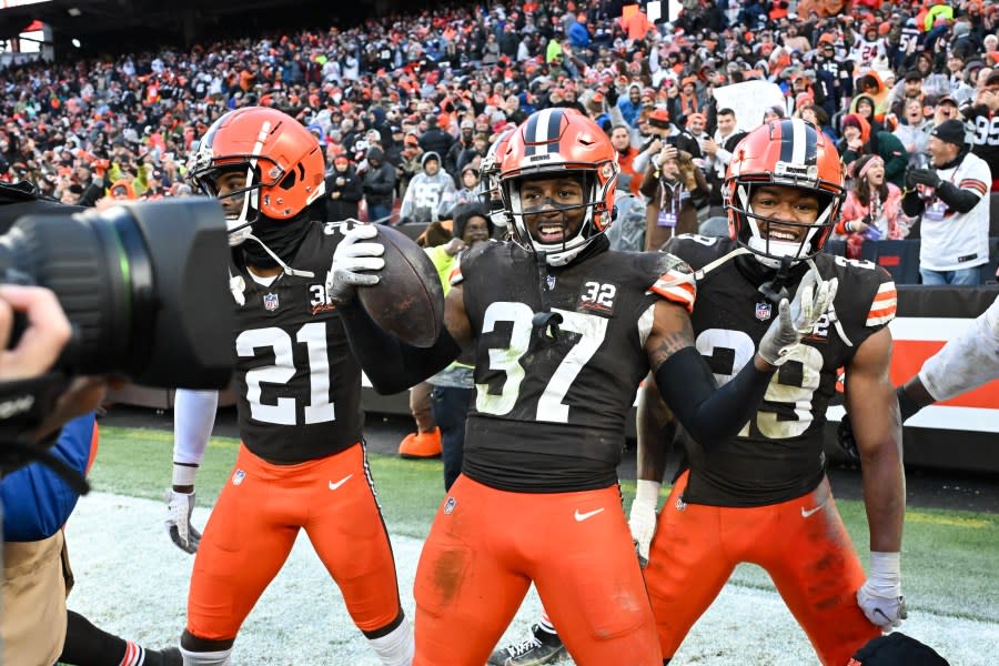CLEVELAND, OHIO – DECEMBER 17: D’Anthony Bell #37 of the Cleveland Browns celebrates with teammates after intercepting a pass in the end zone during the fourth quarter to win the game over the Chicago Bears at Cleveland Browns Stadium on December 17, 2023 in Cleveland, Ohio. (Photo by Nick Cammett/Getty Images)