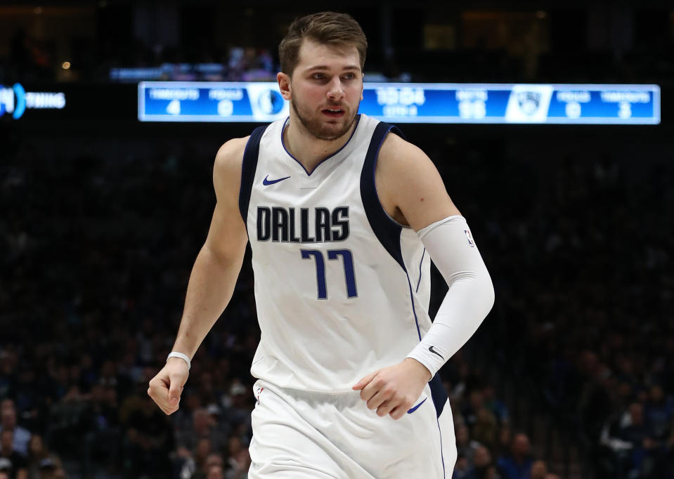 Luka Doncic has been getting manhandled on the court lately, and Mavericks coach Rick Carlisle thinks the referees are letting players get away with it. (Photo by Ronald Martinez/Getty Images)