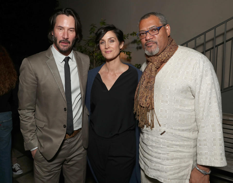 HOLLYWOOD, CA - JANUARY 30:  Keanu Reeves, Carrie-Anne Moss and Laurence Fishburne attend the after party for the premiere of Summit Entertainment's "John Wick: Chapter Two"on January 30, 2017 in Hollywood, California.  (Photo by Todd Williamson/Getty Images)