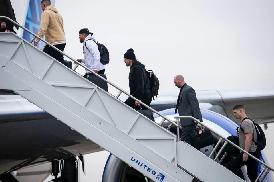 Members of the Kansas City Chiefs board a chartered United flight on their way to Las Vegas for Super Bowl LVIII on Sunday February 4, 2024 at KCI Airport in Kansas City, Missouri.