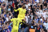 Chelsea's Ruben Loftus-Cheek, right, celebrates after scoring the opening goal during the English FA Cup semifinal soccer match between Chelsea and Crystal Palace at Wembley stadium in London, Sunday, April 17, 2022. (AP Photo/Ian Walton)