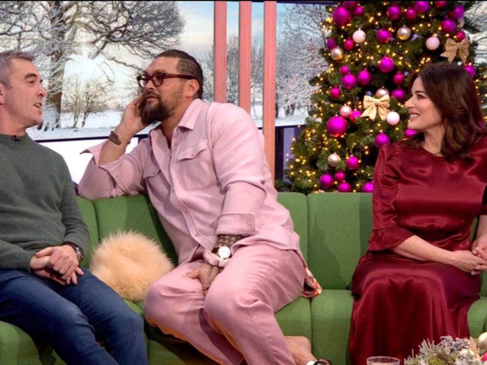 Jason Momoa sits with his back to Nigella Lawson on ‘The One Show’ (BBC)