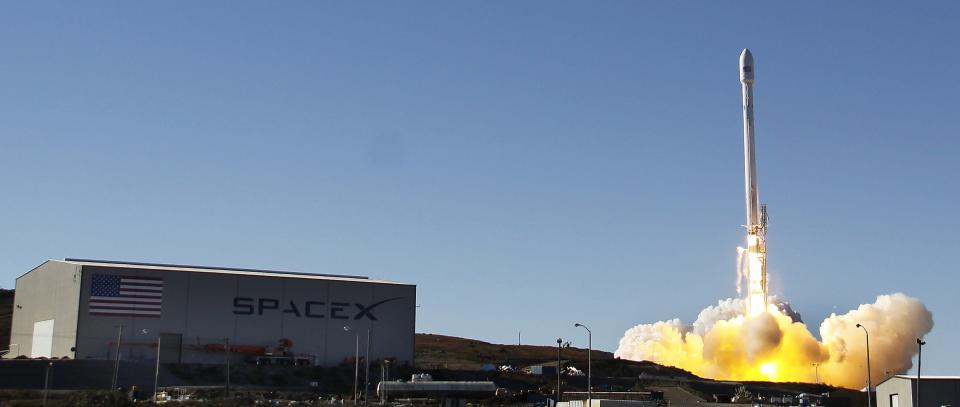 A Falcon 9 rocket carrying a small science satellite for Canada is seen as it is launched from a newly refurbished launch pad in Vandenberg Air Force Station