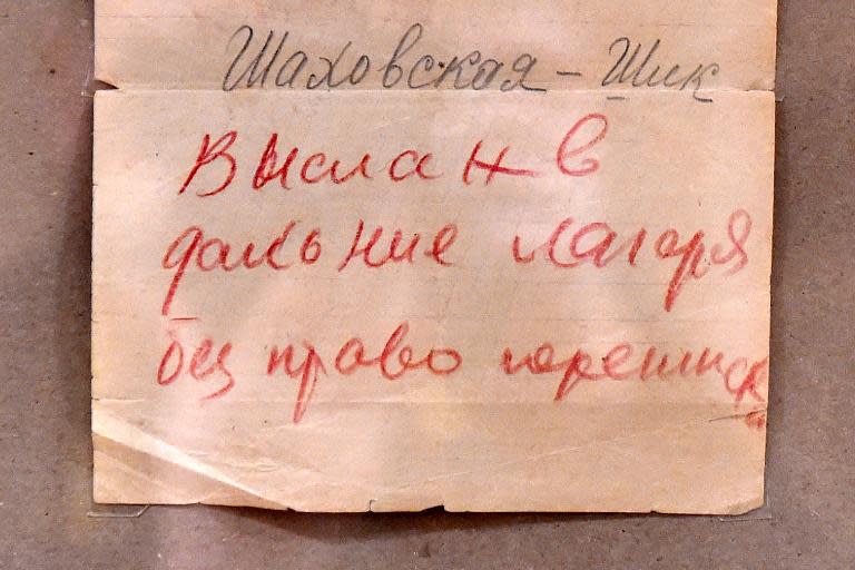 A letter from one of Soviet leader Josef Stalin's political prisoner, reading 'Deported to distant camps without the right of correspondence', is displayed at 'the Right of Correspondence exhibition,' in Moscow, on January 19, 2015