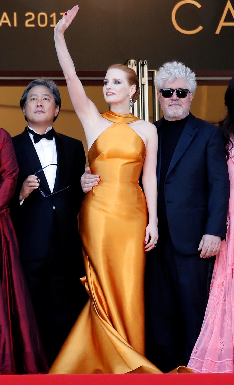 <p>Jessica stood out in an orange halterneck gown by Armani Prive.<br><i>[Photo: Getty]</i> </p>
