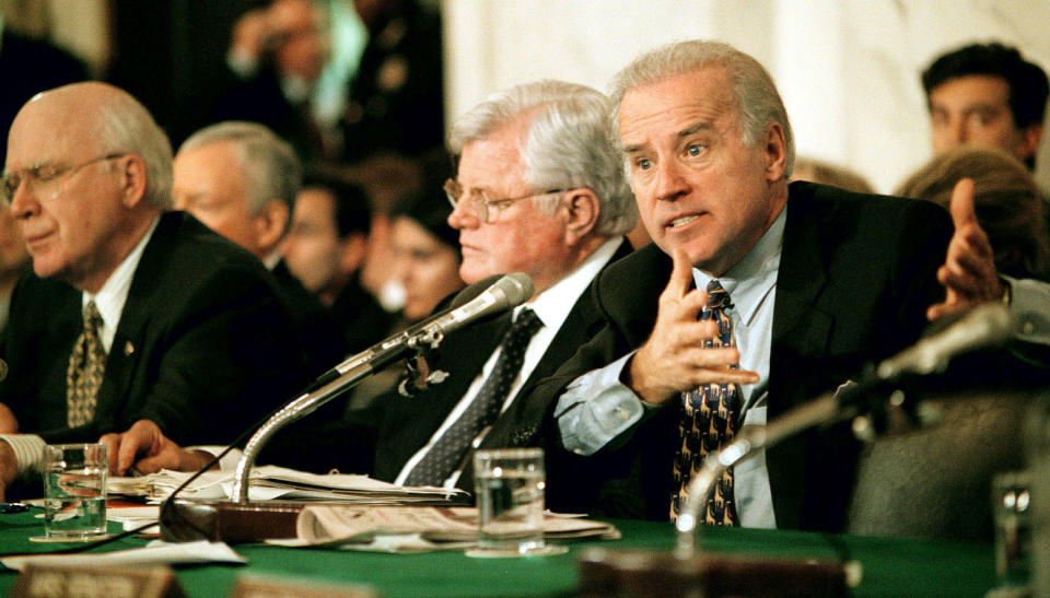 Biden, right, questions John Ashcroft during his confirmation hearing on Jan. 16, 2001. To his left is Edward Kennedy (D-Mass.) and Patrick Leahy (D-Vt.), far left.