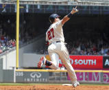 Atlanta Braves' Austin Riley celebrates after hitting his second home run as he rounds second base during the third inning of a baseball game against the Pittsburgh Pirates, Sunday, May 23, 2021, in Atlanta. (Curtis Compton/Atlanta Journal-Constitution via AP)