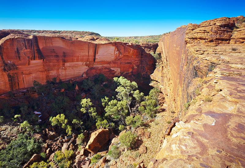 <p>A four-hour drive from Alice Springs and a three-hour one from Uluru; Kings Canyon has the deepest gorge in the Red Centre. 100m high on its plateau the ‘Lost City’, is an area of red sandstone rocks weathered into the semblance of ruined houses and streets. You can circumnavigate it by hiking the 6km Rim Walk, which takes around 3-4 hours.</p>