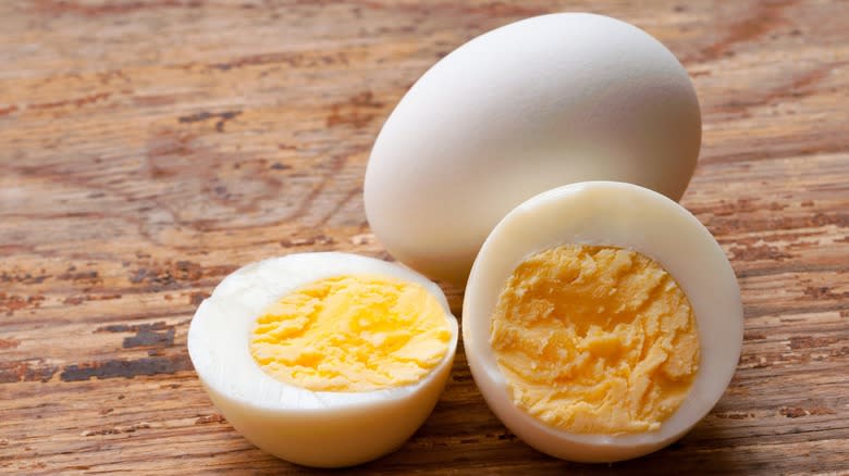 hard-boiled eggs on wooden board