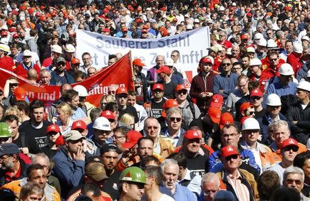 Steel workers of Germany's industrial conglomerate ThyssenKrupp AG and IG Metall union members demonstrate for higher wages in Duisburg, Germany April 11, 2016. REUTERS/Wolfgang Rattay