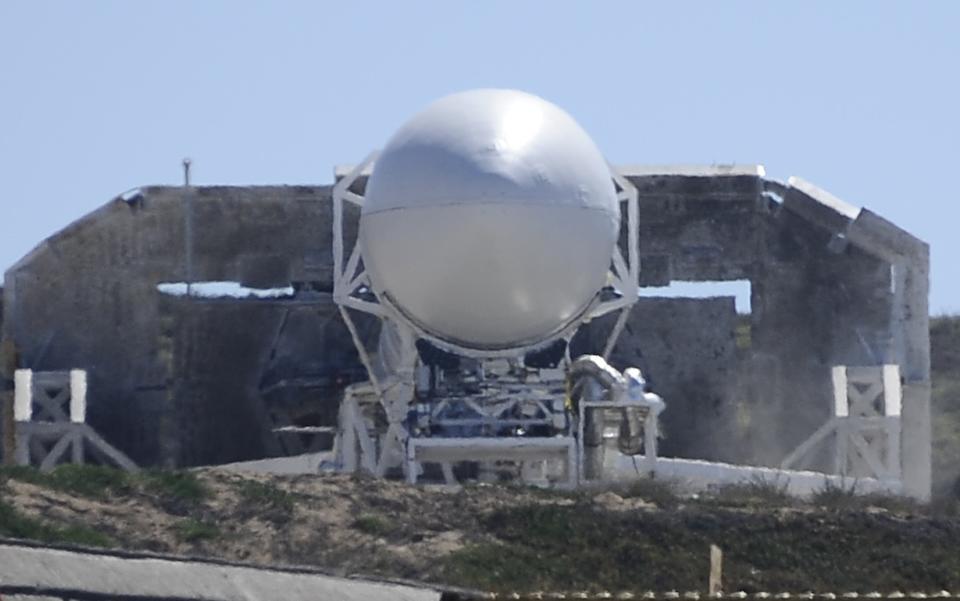 A SpaceX upgraded Falcon 9 rocket undergoes launch preparations at Vandenberg Air Force Base in California September 27, 2013. Privately owned Space Exploration Technologies plans to test an upgraded Falcon 9 rocket on Sunday from a site in California as part of its push into the satellite launch market. Perched on top of the 22-story, beefed-up Falcon 9 will be Canada�s Cassiope science satellite. Liftoff is targeted for 9 a.m. PDT (1600 GMT). �This is essentially a development flight for the rocket,� company founder and chief executive Elon Musk told Reuters. REUTERS/Gene Blevins (UNITED STATES - Tags: SCIENCE TECHNOLOGY BUSINESS)