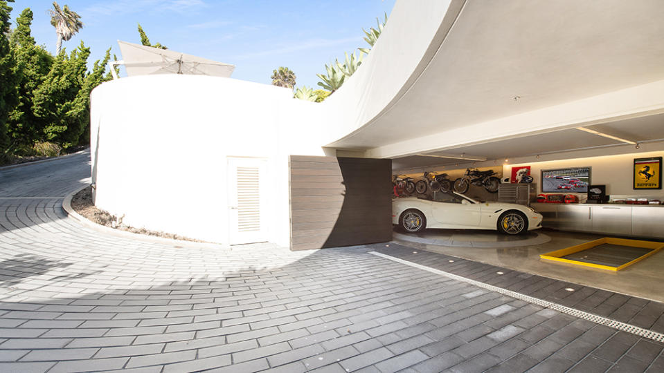 The purpose-built supercar garage. - Credit: Photo: Courtesy of Leigh Ann Rowe and Toby Ponnay/Sotheby’s International Realty
