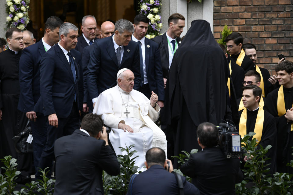 Pope Francis leaves the "Protection of the Mother of God" church after a meeting with a Greek Catholic community, in Budapest, Hungary, Saturday, April 29, 2023. The Pontiff is in Hungary for a three-day pastoral visit. (AP Photo/Denes Erdos)