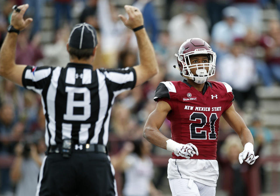 New Mexico State wide receiver Anthony Muse (21) celebrates after scoring a touchdown during the first half of an NCAA college football game against South Alabama in Las Cruces, N.M., Saturday, Dec. 2, 2017. (AP Photo/Andres Leighton)