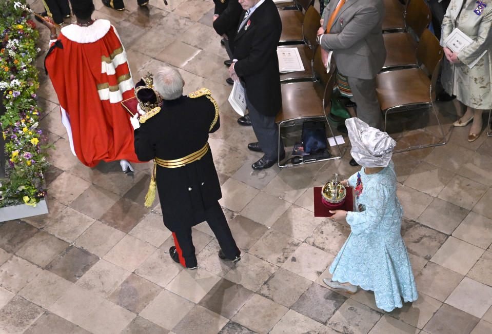 <p>LONDON, ENGLAND - MAY 06: Nicholas Lyons, Lord Mayor of the City of London carries the St Edward's Crown and Professor Dame Elizabeth Anionwu carries the Gold Sovereigns Orb during the Coronation of King Charles III and Queen Camilla on May 06, 2023 in London, England. The Coronation of Charles III and his wife, Camilla, as King and Queen of the United Kingdom of Great Britain and Northern Ireland, and the other Commonwealth realms takes place at Westminster Abbey today. Charles acceded to the throne on 8 September 2022, upon the death of his mother, Elizabeth II. (Photo by Gareth Cattermole/Getty Images)</p> 