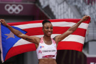 Jasmine Camacho-Quinn, of Puerto Rico, wins the wins a women's 100-meter hurdles final at the 2020 Summer Olympics, Monday, Aug. 2, 2021, in Tokyo. (AP Photo/Matthias Schrader)