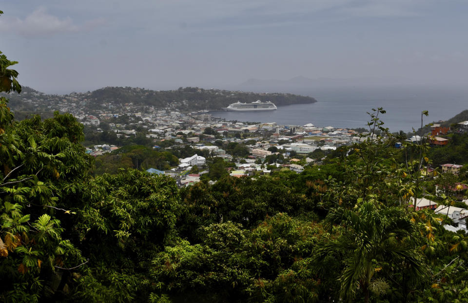 A cruise ship sits docked waiting for passengers to be evacuated in Kingstown, on the eastern Caribbean island of St Vincent due to the eruption of La Soufriere volcano.