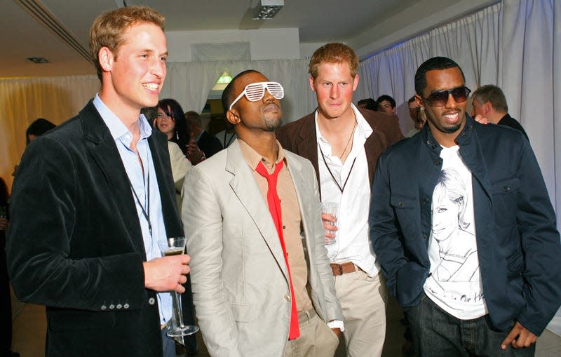 Prince William, left; Kanye West, Prince Harry and P. Diddy pose for the media during a backstage party at Wembley Arena in north London, 01 July 2007. - Image: CARL DE SOUZA / POOL / AFP (Getty Images)